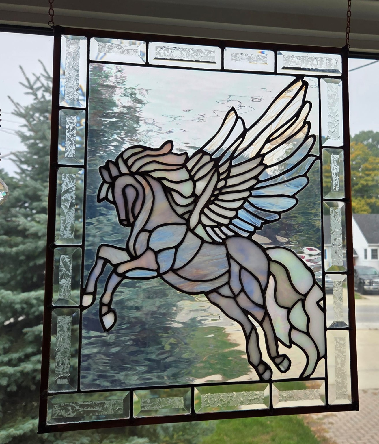 Finished white and iridescent Pegasus stained-glass panel