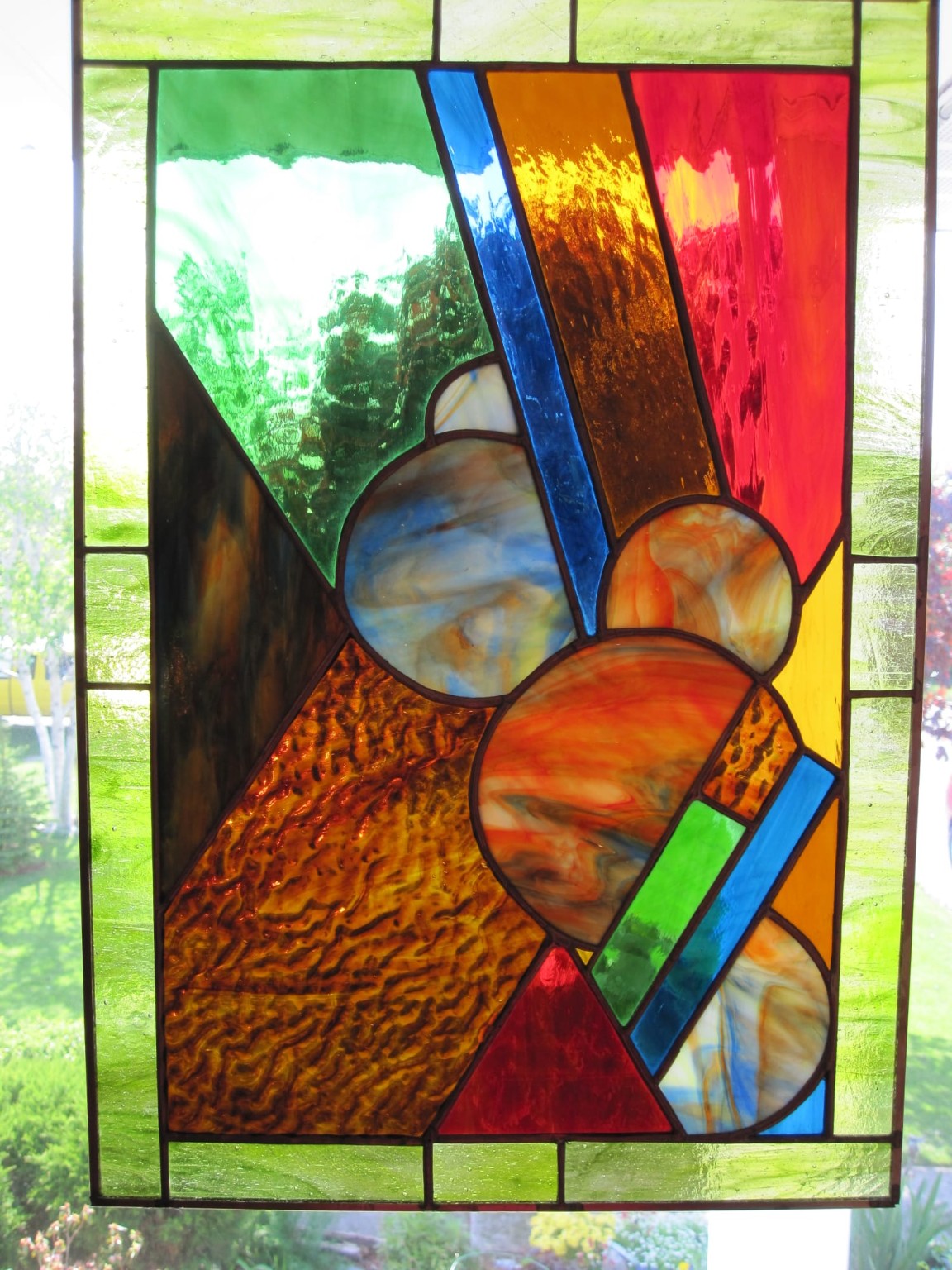 Abstract stained-glass panel created by one of Paul's students